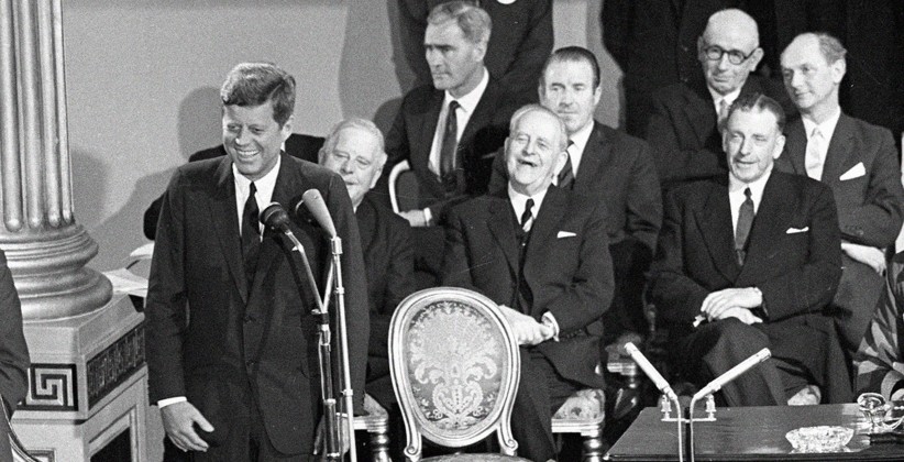 The invited audience in St Patrick's Hall, Dublin Castle, share a humorous moment with JFK. (NLI, Independent Newspapers Collection)
